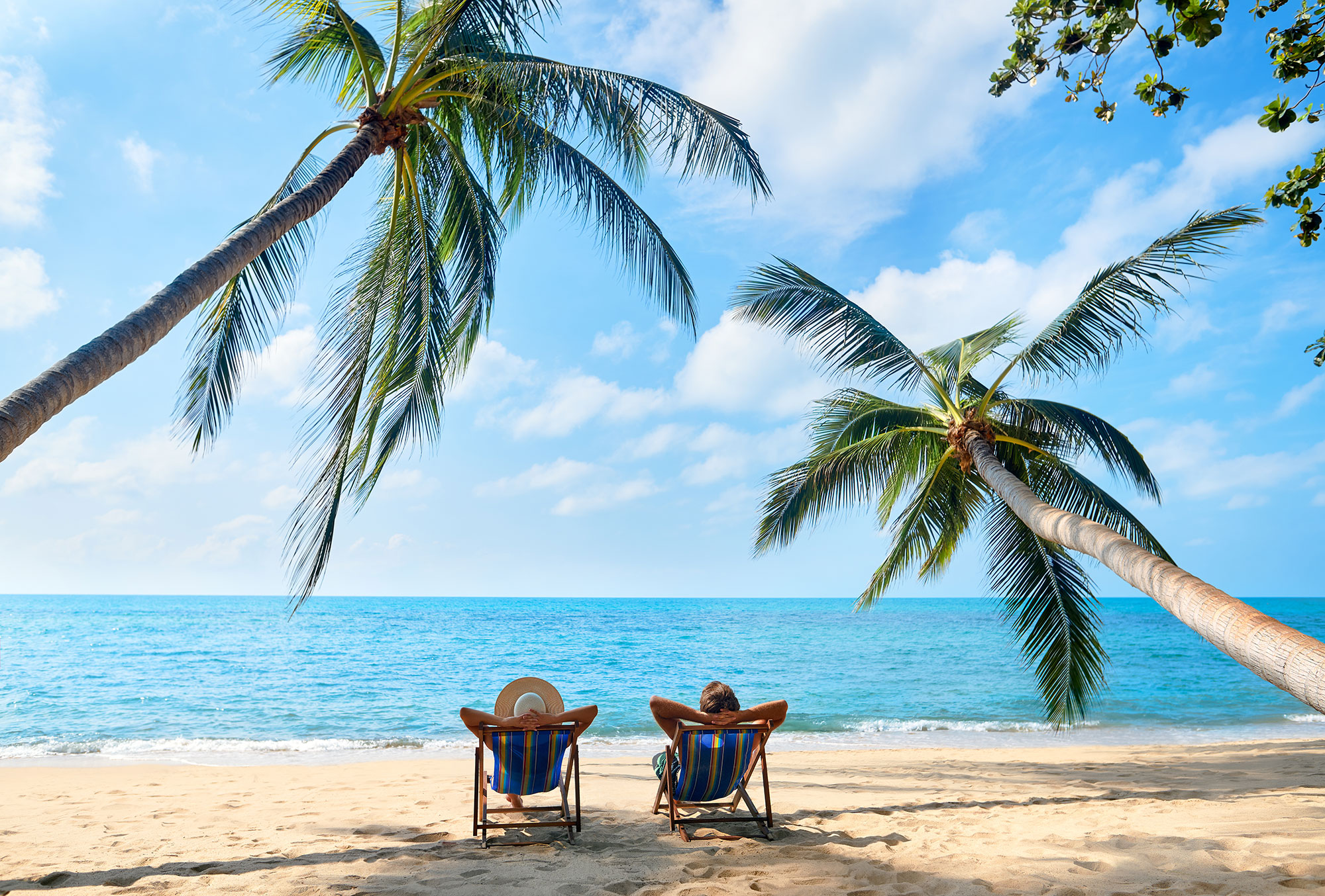 Insel / Strand mit zwei Personen im Sonnenstuhl